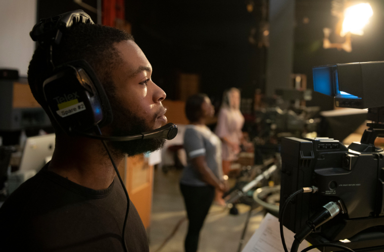 A broadcasting major learning how to operate camera equipment at the University of Louisiana at Lafayette.